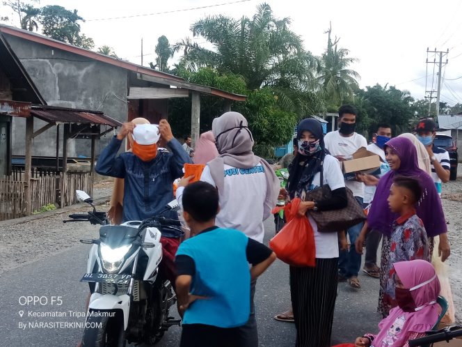 
					Relawan Puji Center Bagi Masker dan Panganan Berbuka Puasa Bagi Pengguna Jalan di Tripa Makmur