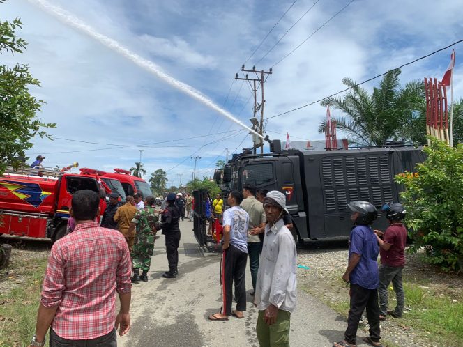 
					Quick Respon Personel Brimob Berhasil Padamkan Kebakaran