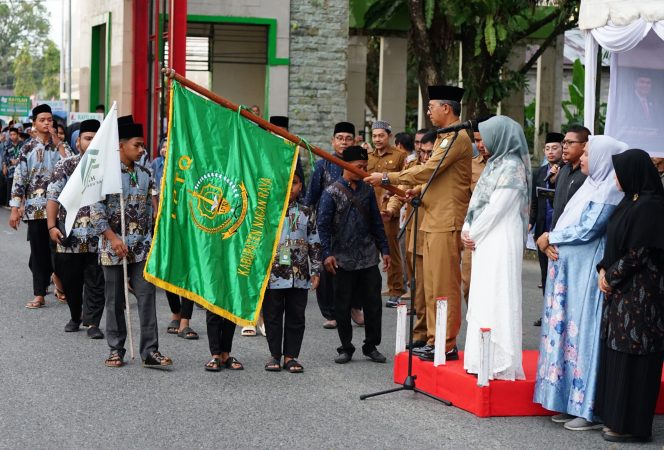 
					Pj. Bupati Iskandar Lepas Pawai Ta’aruf MTQ XII Nagan Raya Tahun 2024