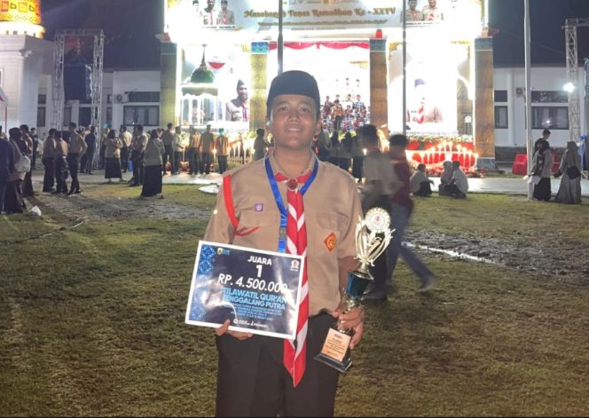 
					Ahmad Luthfi pemenang Tilawah Qur'an MTR ke XXIV dari Kwarcab Aceh Barat Minggu (16/3/2025) foto/ist