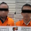 Penyidik Polda Aceh Tahan Dua Karyawan Bank Aceh Syariah Cabang Bener Meriah. Minggu (18/5/2025). | Foto: ist